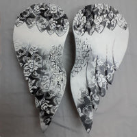 Hand carved angels wings by Rocky Swanson