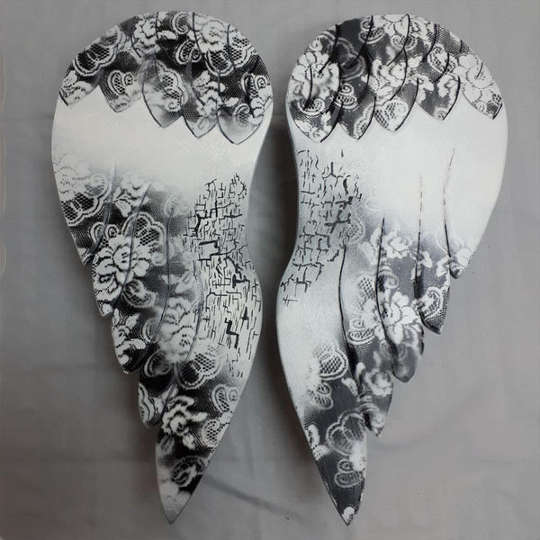 Hand carved angels wings by Rocky Swanson